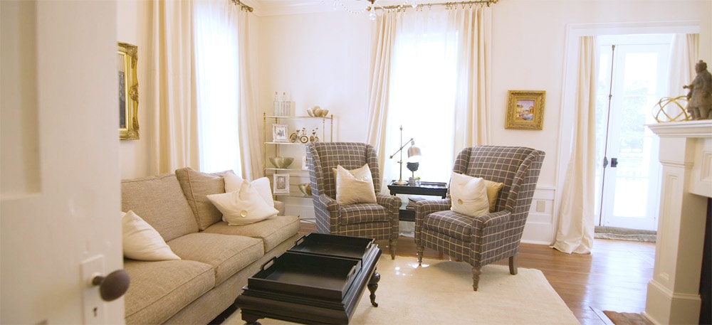 Two chairs and a couch in a remodeled Tanglewood Plantation wedding venue house